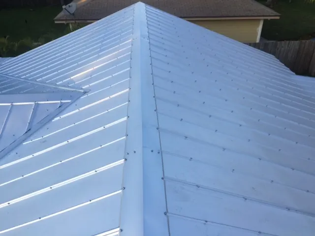 Unpainted silver metal roof panels