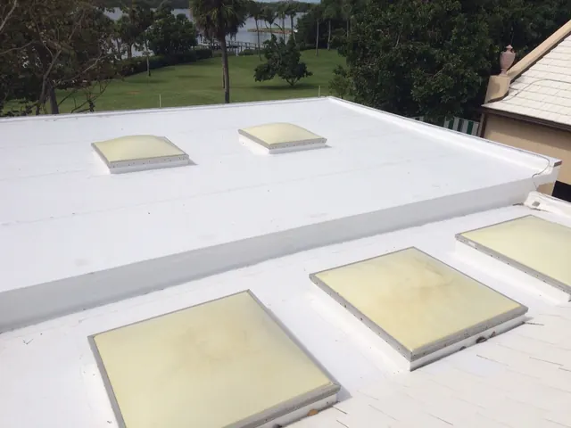 White flat roof with skylights