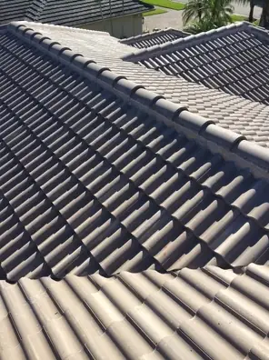 Grey concrete barrel tile roof